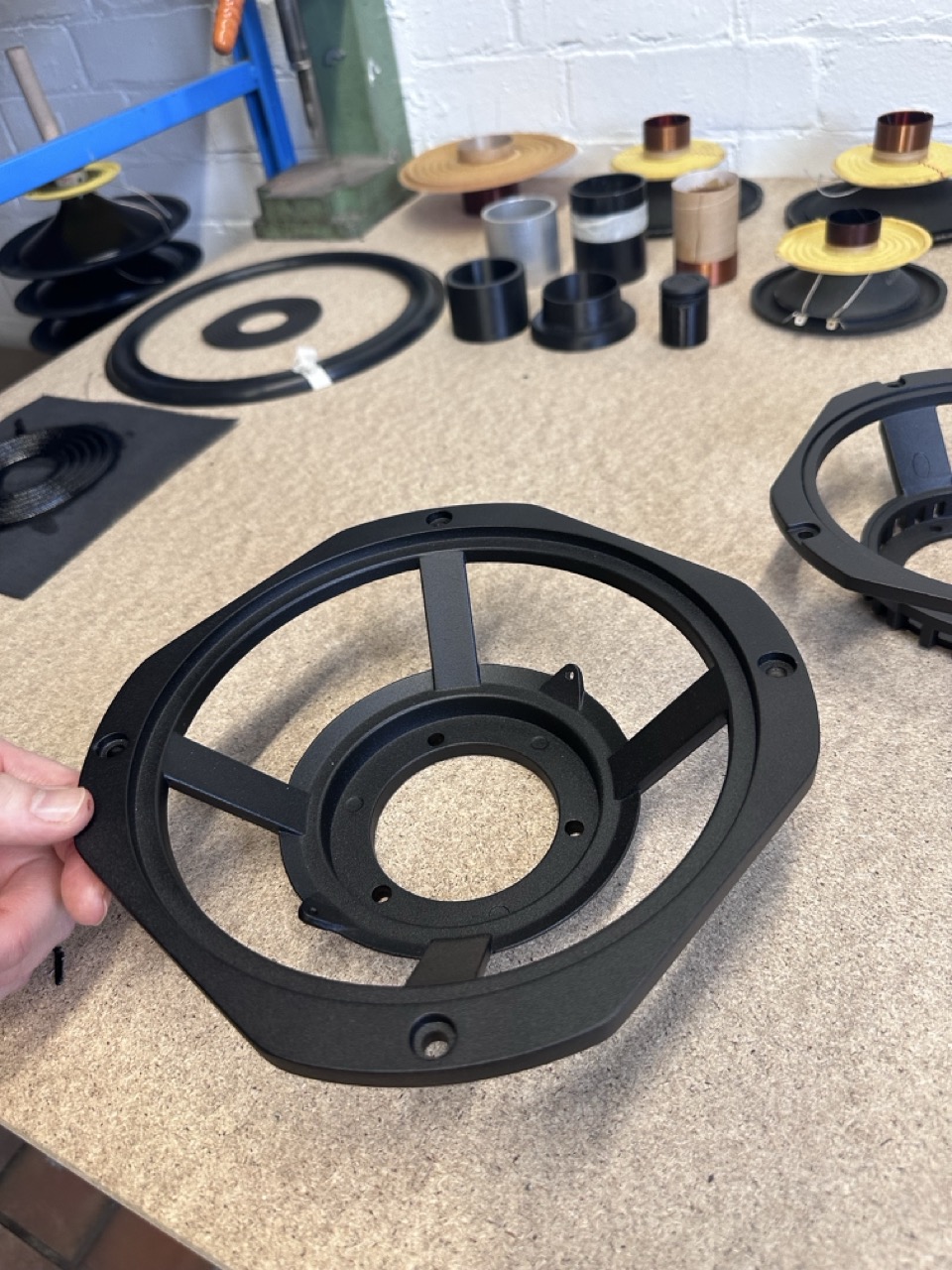 A black powder-coated basket.