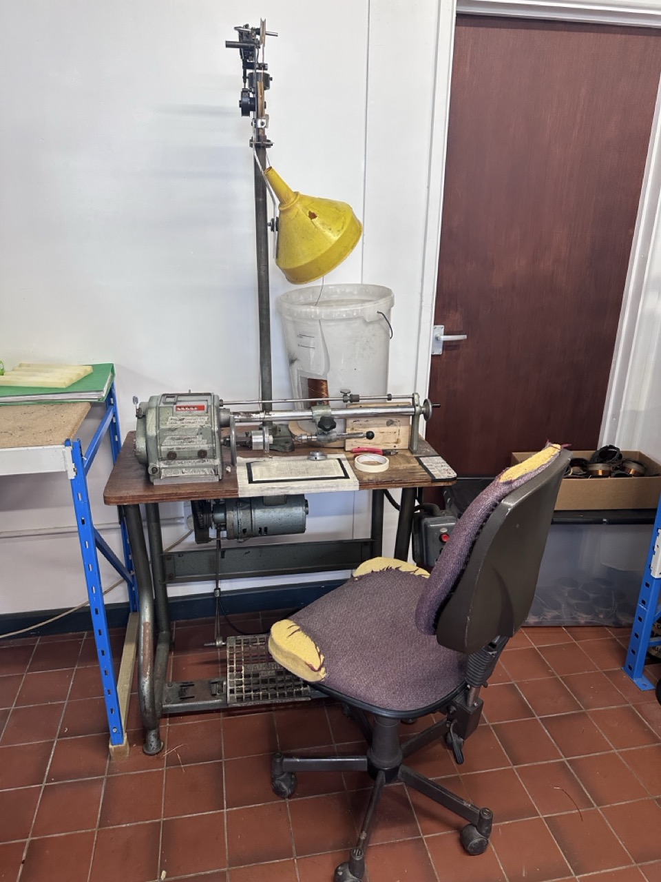 An old-school inductor winding machine.