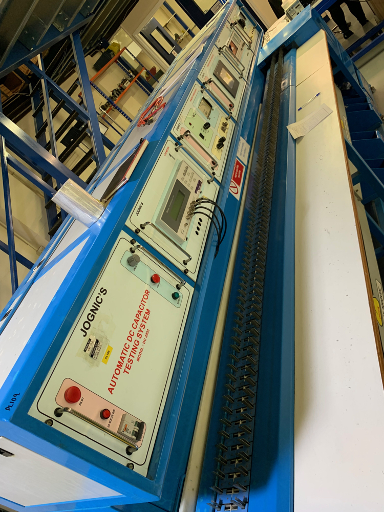 Final test capacitance / insulation resistance and power factor. Here they can test multiple capacitors at one time.